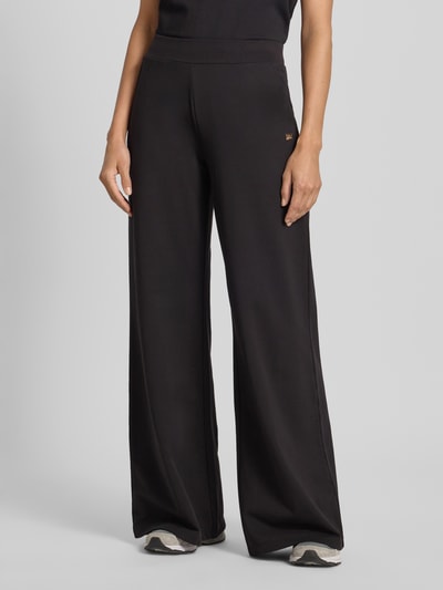 EA7 Emporio Armani Sweatpants met wijde pijpen en labeldetail Zwart - 4