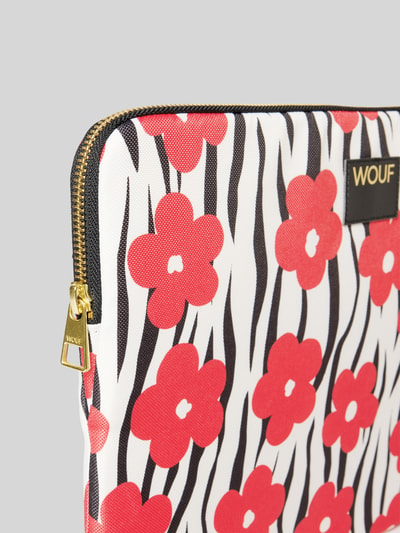 Produktfoto, torba na laptop z naszywką z logo, model 'Wildflower' od WOUF, główna przegroda z zamkiem błyskawicznym, zwierzęcy nadruk na całej powierzchni, kwiatowy nadruk na całej powierzchni