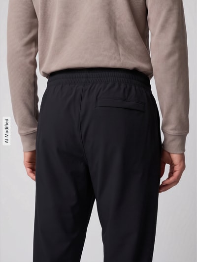Under Armour Tapered Fit Trainingshose mit Logo Print Modell 'Vibe' Black 3