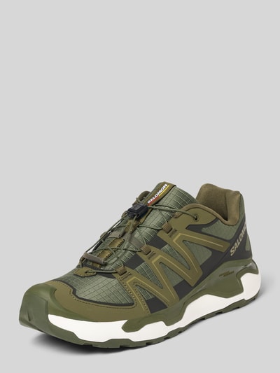 Produktfoto, Sneaker mit Logo-Detail Modell 'Roam' von Salomon in Olivgrün mit abgerundeter Passform, profilierter Sohle, Absatzhöhe 3 cm, Schafthöhe 8 cm, Schaftweite 7 cm.
