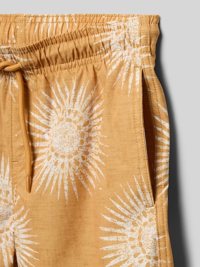 Productfoto, Badehose met steekzakken model 'MAUI' van Jack & Jones, loose fit, elastische tailleband met koord, zakdetails, kindermode, okergeel met witte zonpatronen, zicht op stofstructuur