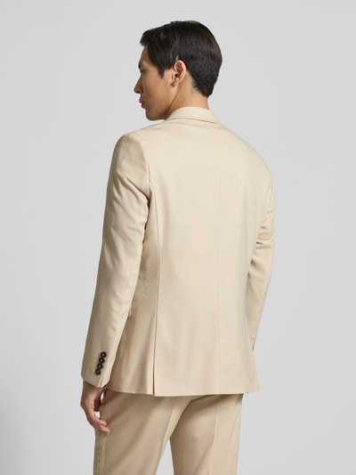 Männermodel trägt Slim Fit Anzugsakko mit Woll-Anteil Modell 'SLIM-NEIL' von SELECTED HOMME in Optik: Unifarben, Rückenschlitz, Ganzkörperansicht Rückansicht