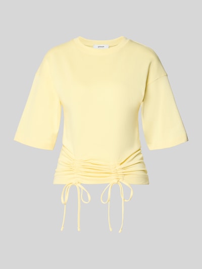 Produktfoto, Damski t-shirt z bawełny o prostym kroju, model 'MALLE' od Topshop, okrągły dekolt, wiązania z marszczeniem, długość tyłu 66 cm w rozmiarze S, kolor jasny żółty, gładka tekstura