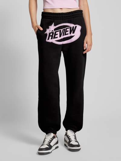 Review Regular Fit Sweatpants mit Label-Print Black 4