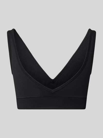 Produktfoto, schwarzes Bustier mit Stretch-Anteil von aim'n, breiter Rippbund, tiefer V-Ausschnitt, eng anliegende Passform, Label-Detail