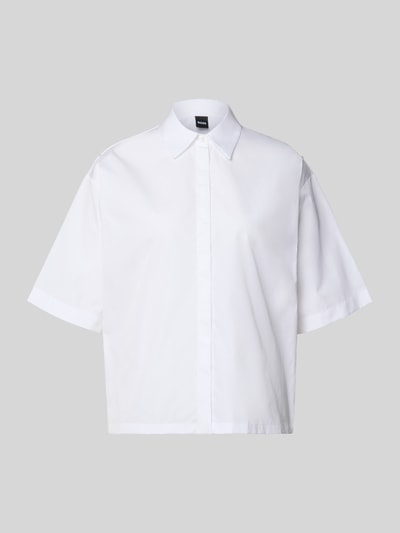 Produktfoto, Oversized Hemdbluse aus reiner Baumwolle Modell 'BIMINA' von BOSS, Optik: Unifarben, Passform: Oversized, Kragenform: Hemdkragen, Applikation: Label-Detail, Verschluss: verdeckte Knopfleiste, Ärmelform: Kurzarm, Materialverarbeitung: Popeline, schlichtes Weiß, klare Linien, glatte Textur.