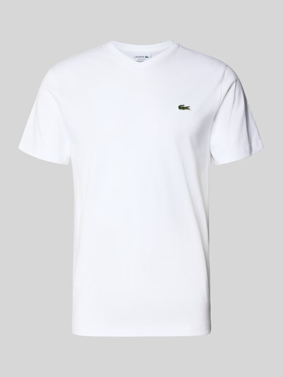 Produktfoto, Regular Fit T-Shirt aus reiner Baumwolle von Lacoste in Weiß, unifarben mit Logo-Stitching, V-Ausschnitt, kurzarm.