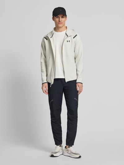 Under Armour Relaxed Fit Trainingshose mit Cargotaschen Modell 'Unstoppable' Black 1