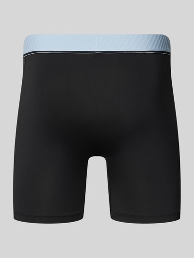 Männermodel trägt Trunks im 3er-Pack mit elastischem Logo-Bund von adidas Sportswear, Optik: Unifarben, Jersey, Ganzkörperansicht Rückansicht.