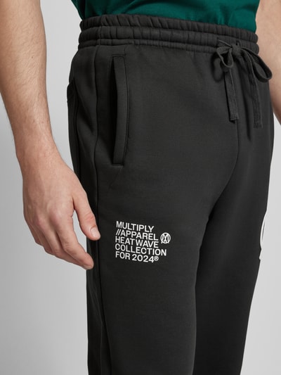 Multiply Apparel Spodnie dresowe o kroju regular fit z nadrukiem z logo Czarny 3