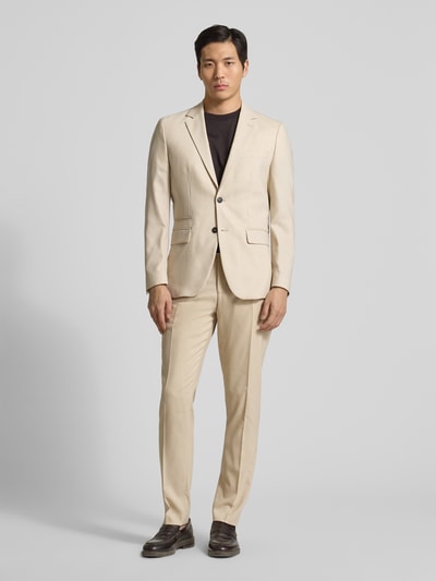 Männermodel trägt Slim Fit Anzugsakko mit Woll-Anteil Modell 'SLIM-NEIL' von SELECTED HOMME, Optik: Unifarben, Ganzkörperansicht von vorne.