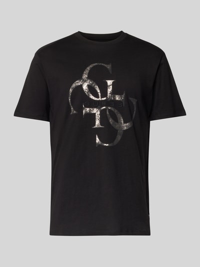 Produktfoto, T-Shirt mit Label-Detail von Guess, czarny, prosty krój, czysta bawełna, nadruk z logo, długość tyłu w rozmiarze M: 69 cm