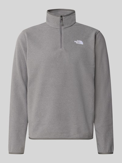 Produktfoto, grauer Fleecepullover mit Troyer-Kragen Modell 'GLACIER' von The North Face, gerader Schnitt, feine Textur