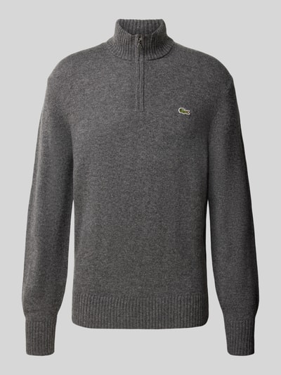 Produktfoto, Troyer aus Wolle mit Logo-Patch von LACOSTE, unifarbenes Strickmaterial in Grau, Reißverschluss, gerippte Abschlüsse