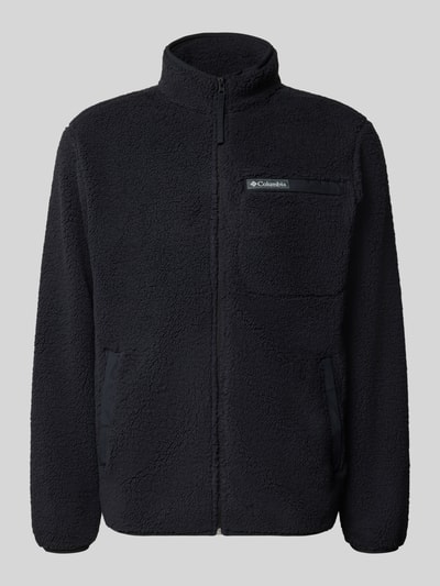 Produktfoto, Regular Fit Fleecejacke mit Logo-Patch von Columbia in Schwarz, mit Brusttasche, Stehkragen und elastischen Abschlüssen.