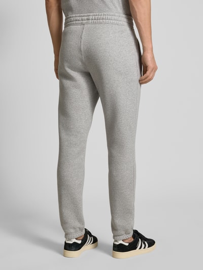 adidas Originals Spodnie dresowe z elastycznym pasem i wpuszczanymi kieszeniami Jasnoszary melanż 5