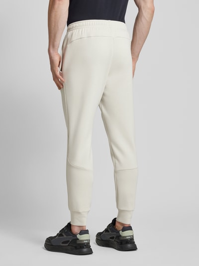 Under Armour Regular Fit Sweatpants mit Reißverschlusstasche Modell 'UNSTOPPABLE' Offwhite 5