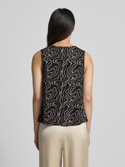 Vrouwenmodel draagt Loose Fit Top uit pure viscose model 'EASY JOY' van Vero Moda met alloverprint, mouwloos, V-hals, rugaanzicht, dames top