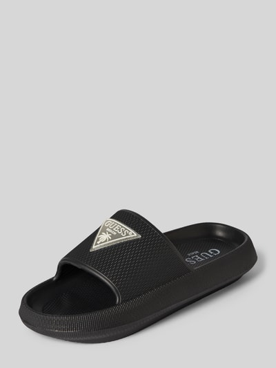 Productfoto, zwarte Sandalette met afgeronde neus en instapvorm, Label-applicatie, model 'RUBBER SLIPPERS' van Guess, hakhoogte 4 cm