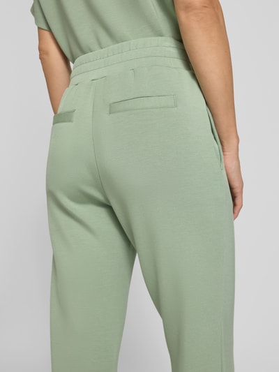 VARLEY Spodnie dresowe z lamowanymi kieszeniami model ‘the slim cuff’ Jasnozielony 3