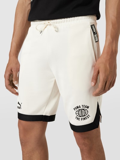 PUMA PERFORMANCE Shorts mit Label-Print Sand 3