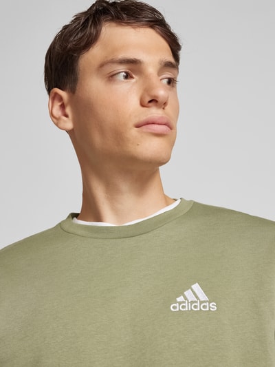 ADIDAS SPORTSWEAR Sweatshirt mit Label-Stitching Modell 'FEELCOZY' Oliv 3