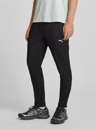 PUMA Performance Tapered Fit Trainingshose mit elastischem Bund Modell 'TAD ESSENTIALS' Black 4