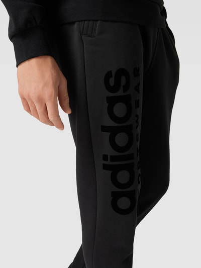 ADIDAS SPORTSWEAR Spodnie dresowe z nadrukiem z logo Czarny 3
