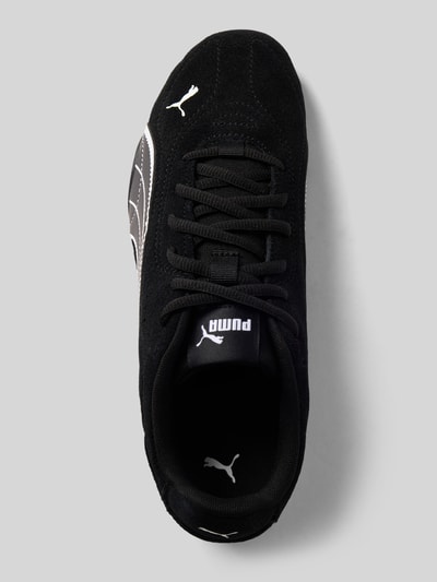 Produktfoto, Sneaker mit Logo-Detail von PUMA, schwarze Oberfläche aus Wildleder mit weißen Akzenten, Damen Sneaker von PUMA