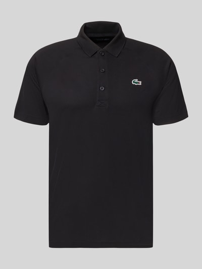 Produktfoto, Regular Fit Sport Poloshirt mit Label Patch von Lacoste Sport in Schwarz, unifarben, Polokragen, Kurzarm, Piqué-Material, 3-Knopf-Verschluss.