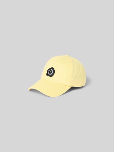 Produktfoto, Basecap aus reiner Baumwolle von Kenzo in Hellgelb mit verstärktem Schirm, Label-Patch, Riegel, Belüftungslöcher, glatte Oberfläche.