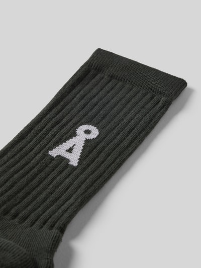 Productfoto, uniseks Sokken uit katoenmix model 'SAAMUS BOLD' van Armedangels, effen zwart met geribde boord, labeldetail, stretchmateriaal.