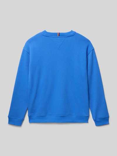 Produktfoto, Regular Fit Sweatjacke aus Baumwoll-Mix von Tommy Hilfiger Teens w kolorze niebieskim, materiał gładki, crew neck, rękawy i dół ze ściągaczem, krój regular fit, aplikacja label print, materiał sweat, bawełna-mix