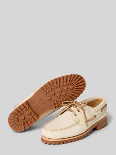Produktfoto, Bootsschuhe aus Leder mit profilierter Sohle von Timberland in beige mit afgeronde punt, vetersluiting, profielzool, hakhoogte 3 cm, schachthoogte 7 cm, schachtbreedte 9 cm, echt leer, heren