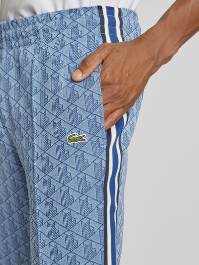 Lacoste Spodnie dresowe o kroju regular fit z naszywką z logo Jasnoniebieski 3