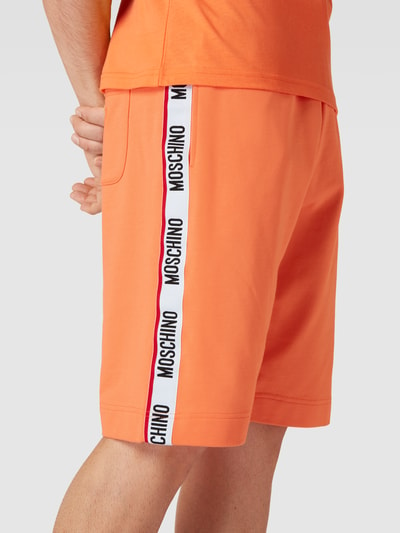 Moschino Swim + Underwear Sweatshorts mit Galonstreifen Orange 3