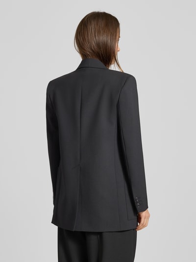 Frauenmodel trägt Loose Fit Longblazer mit Schurwoll-Anteil Modell 'VELOCE' von Weekend Max Mara, Optik: Unifarben, Ganzkörperansicht Rückansicht.
