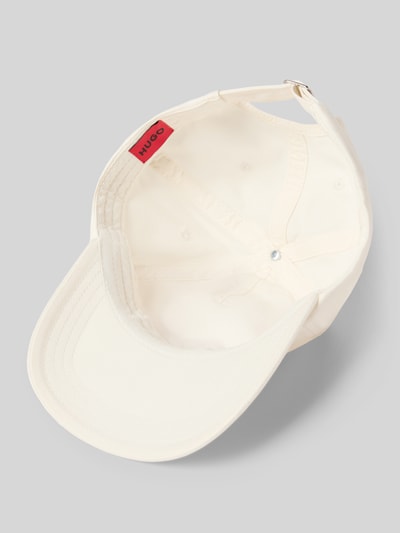 Produktfoto, Basecap aus reiner Baumwolle Modell 'CARA-VALENTINE' von HUGO in Unifarbe mit Label-Schriftzug, eingestickten Luftlöchern, verstellbarem Riegel.