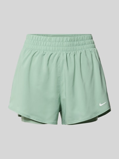 Produktfoto, Shorts im 2-in-1-Look mit Logo von NIKE TRAINING in hellem Mintgrün, elastischer Bund, glatte Struktur, Regular Fit