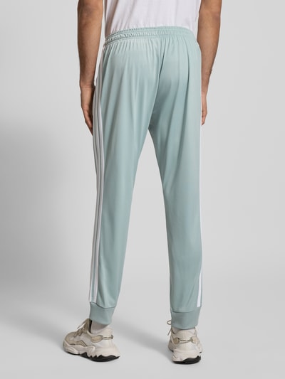 adidas Sportswear Spodnie dresowe w kroju slim fit z haftowanym logo Miętowy 5