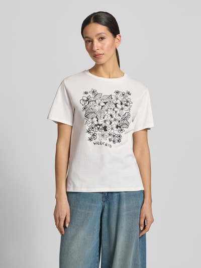 Frauenmodel trägt Relaxed Fit T-Shirt aus reiner Baumwolle Modell 'BORA' von Weekend Max Mara, Optik: Unifarben, Motiv-Stickerei, Rundhals, Kurzarm, Jersey, Ganzkörperansicht von vorne.