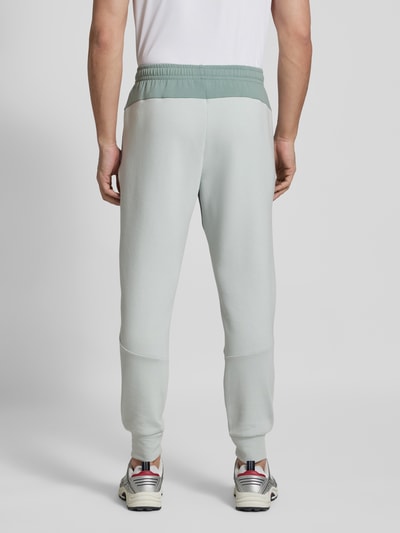 Under Armour Relaxed Fit Sweatpants mit Logo-Print Modell 'Unstoppable' Mint 5