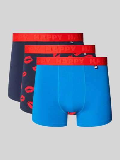Produktfoto, obcisłe bokserki Trunks aus Baumwoll-Mix Modell 'Kisses Up' im 3er-Pack od Happy Socks, kolory niebieski i granatowy z czerwonym pasem z logo, mieszanka bawełny i elastanu, dopasowany krój, detal z logo, zestaw 3 szt.