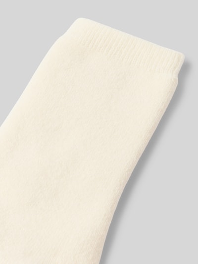 Produktfoto, Socken aus Woll-Mix von camano in Creme, feine Rippstruktur, Label-Detail, elastisches Bündchen, Damen Socken.
