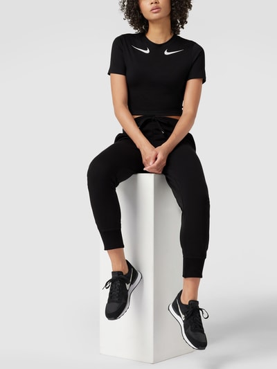 NIKE TRAINING Spodnie dresowe z nadrukiem z logo Czarny 1