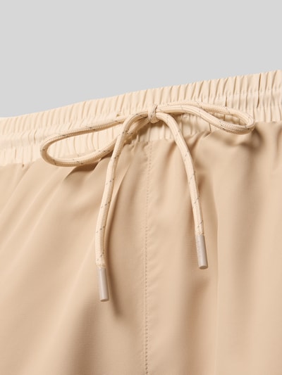 Productfoto, Badeshorts met contrast-logo model 'STARFISH' van BOSS, effen beige, elastische tailleband met tunnelkoord, labelprint, contrastnaad, zij- en achterzakken, gladde structuur
