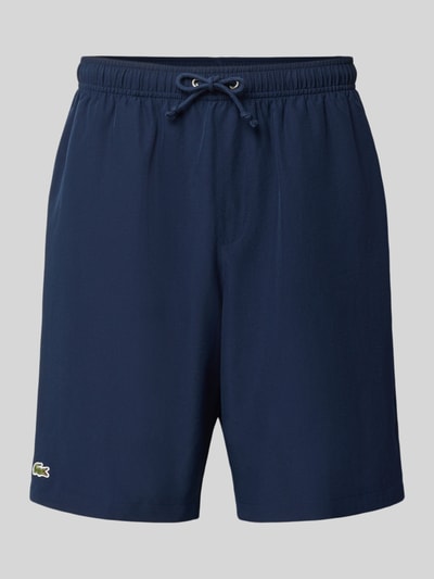 Produktfoto, Relaxed Fit Shorts mit Logo-Patch von Lacoste in Dunkelblau mit glatter Textur, Herren Sportshorts von Lacoste Sport