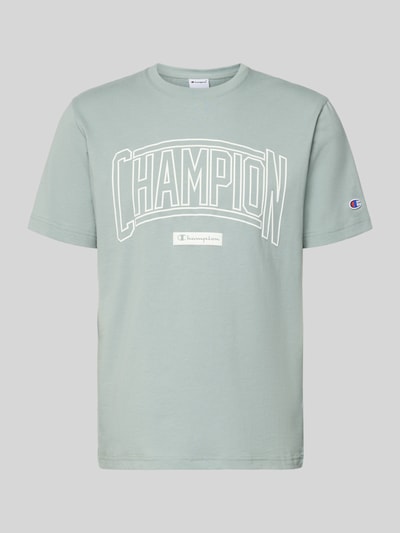 Produktfoto, T-Shirt mit Logo und Rundhalsausschnitt von CHAMPION in hellem Grün, reine Baumwolle, Regular-Fit, Label-Stitching, Rückenlänge 70 cm Größe M