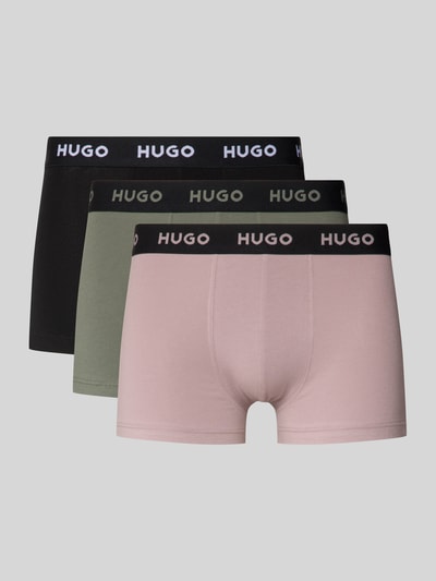 Produktfoto, Slim Fit Trunks aus Baumwoll-Mix im 3er-Pack Modell 'PACK' von HUGO in Optik: Unifarben, Passform: Slim-Fit, Label-Schriftzug auf elastischem Bundabschluss, Materialverarbeitung: Stretch-Jersey, Multipack: 3er-Pack, sanfte Oberflächenstruktur in Schwarz, Grün und Rosa.