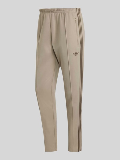 adidas Originals Slim Fit spodnie dresowe z mieszanki bawełny z kantami Piaskowy 2